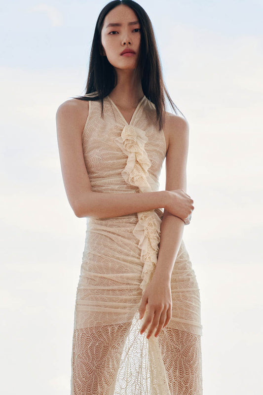 Lace dress with ruffles embellished